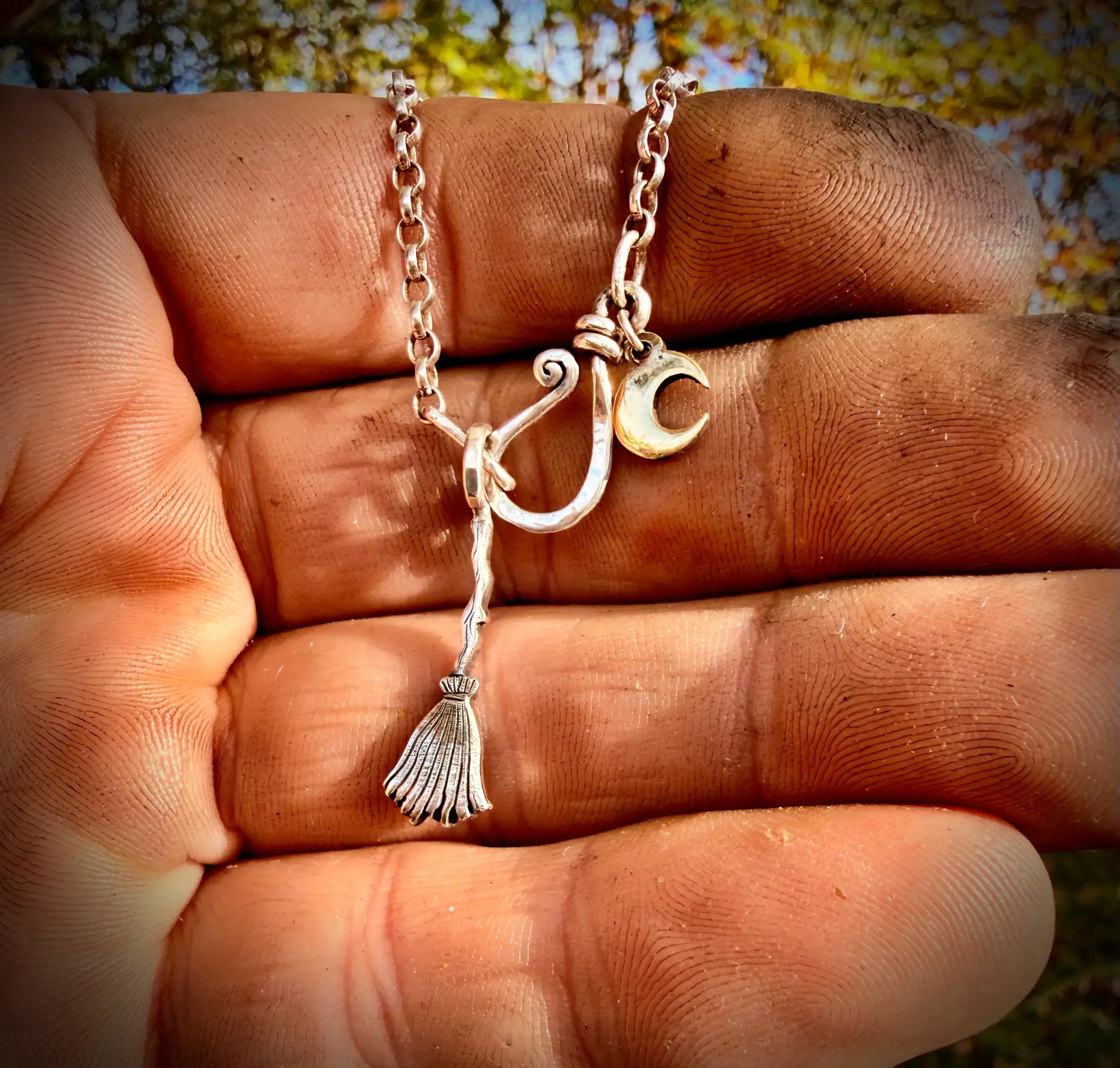 witch's broomstick charm a witches amulet and etc.